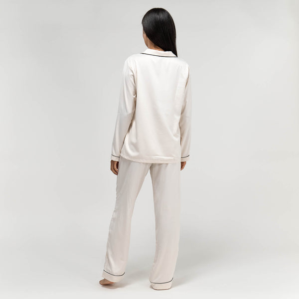 Pigiama Pantalone da Donna in Raso - Panna Fabric Close-up Image